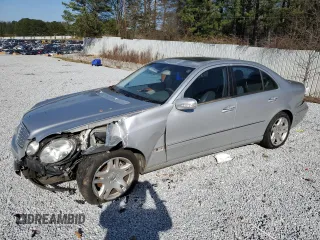 2003 Mercedes-Benz E-Class 5.0L with VIN WDBUF70J93A086939, listed as a Copart auction lot 87022834 with 0 mi miles and Salvage Title. Bid and sale history available at carsss.com. Image 1.