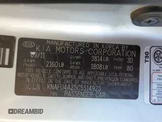 2012 Kia Forte EX with VIN KNAFU4A25C5514923, listed as a Copart auction lot 71429814 with 122,172 mi miles and Salvage Title. Bid and sale history available at carsss.com. Image 12.