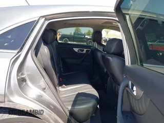2015 Infiniti QX70 with VIN JN8CS1MW1FM481233, listed as a IAAI auction lot 41976458 with 134,875 mi miles and . Bid and sale history available at DreamBid. Image 8.