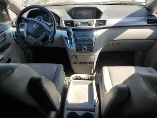2011 Honda Odyssey Touring с VIN 5FNRL5H92BB063040, выставлен на аукционе Copart как лот 58551765 с пробегом 236 526 миль миль и Списание • Salvage title. История ставок и продаж доступна на DreamBid. Изображение 8.