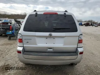 2011 Mercury Mariner z VIN 4M2CN8B73BKJ06886, wystawiony jako Copart lot #50308485 z przebiegiem 118 584 mil mil oraz Szkoda całkowita • Salvage title. Historia ofert i sprzedaży dostępna na DreamBid. Obrazek 6.