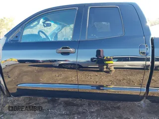 2012 Toyota Tundra z VIN 5TFUW5F14CX217964, wystawiony jako IAAI lot #41265024 z przebiegiem 144 426 mil mil oraz . Historia ofert i sprzedaży dostępna na DreamBid. Obrazek 15.