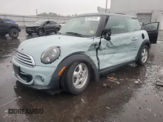 2011 MINI Hardtop with VIN WMWSU3C57BT096973, listed as a Copart auction lot 52726185 with 90,545 mi miles and Salvage title. Bid and sale history available at DreamBid. Image 1.