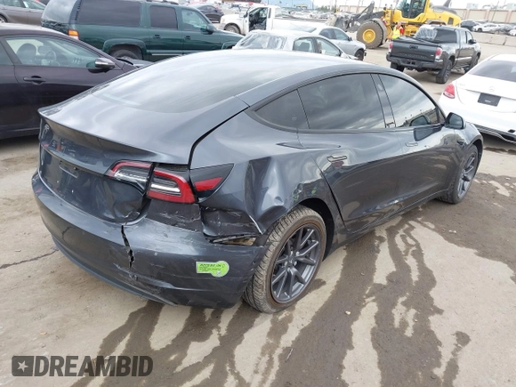 2018 Tesla Model 3 Long Range Battery with VIN 5YJ3E1EA0JF101564, listed as a IAAI auction lot 41902214 with 101,581 mi miles. Bid and sale history available at carsss.com. Image 4.