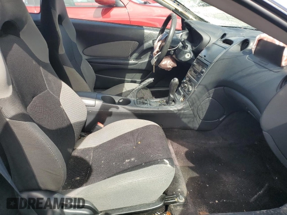 2003 Toyota Celica GT z VIN JTDDR32T730157268, wystawiony jako Copart lot #68884804 z przebiegiem 209 728 mil mil oraz Nie do naprawy • Non repairable. Historia ofert i sprzedaży dostępna na DreamBid. Obrazek 7.