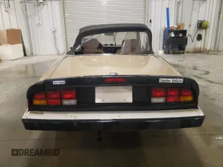 1986 Alfa Romeo Spider Veloce z VIN ZARBA541XG1037976, wystawiony jako Copart lot #50330035 z przebiegiem 47 885 mil mil oraz Szkoda całkowita • Salvage title. Historia ofert i sprzedaży dostępna na DreamBid. Obrazek 6.