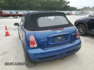 2007 MINI Convertible S with VIN WMWRH33567TJ45123, listed as a Copart auction lot 55702735 with 60,117 mi miles and Salvage title. Bid and sale history available at DreamBid. Image 6.