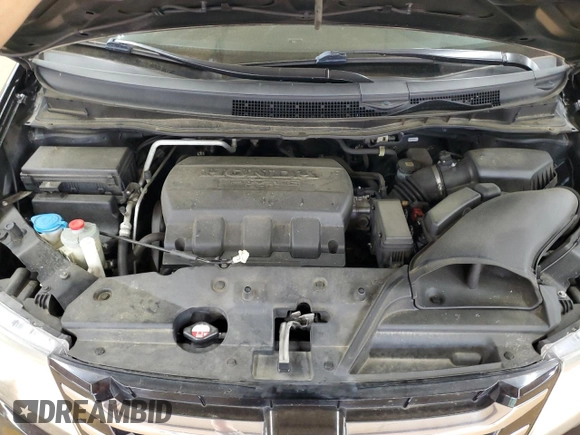 2015 Honda Odyssey Touring Elite with VIN 5FNRL5H99FB005576, listed as a Copart auction lot 58963215 with 167,967 mi miles and Salvage title. Bid and sale history available at DreamBid. Image 12.