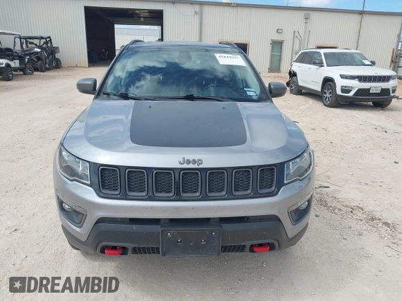 2020 Jeep Compass Trailhawk z VIN 3C4NJDDB5LT171727, wystawiony jako IAAI lot #41844523 z przebiegiem 103 952 mil mil oraz . Historia ofert i sprzedaży dostępna na DreamBid. Obrazek 12.