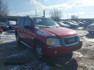 2003 GMC Envoy SLE with VIN 1GKDT13S732131869, listed as a IAAI auction lot 41422135 with 163,193 mi miles. Bid and sale history available at carsss.com. Image 1.