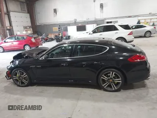 2016 Porsche Panamera S E-Hybrid z VIN WP0AD2A74GL040039, wystawiony jako IAAI lot #42411042 z przebiegiem 60 616 mil mil oraz . Historia ofert i sprzedaży dostępna na DreamBid. Obrazek 15.