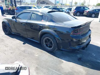 2019 Dodge Charger SRT Hellcat z VIN 2C3CDXL91KH749445, wystawiony jako IAAI lot #42300340 z przebiegiem 68 224 mil mil oraz . Historia ofert i sprzedaży dostępna na DreamBid. Obrazek 3.