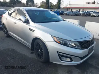 2014 Kia Optima LX z VIN 5XXGM4A75EG275374, wystawiony jako IAAI lot #41474978 z przebiegiem 155 013 mil mil oraz . Historia ofert i sprzedaży dostępna na DreamBid. Obrazek 1.