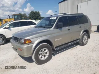1999 Mitsubishi Montero LS z VIN JA4LS31H8XP026225, wystawiony jako Copart lot #71874604 z przebiegiem 243 182 mil mil oraz Szkody całkowita. Historia ofert i sprzedaży dostępna na DreamBid. Obrazek 1.
