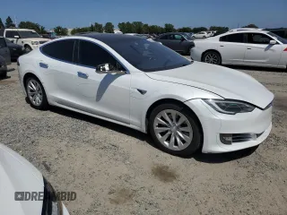 2018 Tesla Model S 75D with VIN 5YJSA1E29JF281143, listed as a Copart auction lot 54208145 with 132,722 mi miles and Salvage title. Bid and sale history available at DreamBid. Image 4.