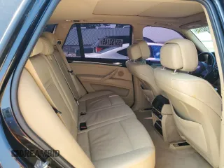 2012 BMW X5 35i with VIN 5UXZV4C57CL756062, listed as a Copart auction lot 65752145 with 160,860 mi miles and Clean title. Bid and sale history available at DreamBid. Image 11.