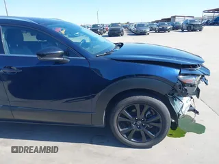 2021 Mazda CX-30 Premium with VIN 3MVDMBDYXMM307047, listed as a IAAI auction lot 41974966 with 53,409 mi miles and . Bid and sale history available at carsss.com. Image 18.