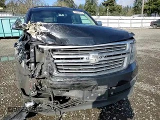 2015 Chevrolet Tahoe LTZ z VIN 1GNSKCKC5FR638011, wystawiony jako Copart lot #49269395 z przebiegiem 127 427 mil mil oraz Szkoda całkowita • Salvage title. Historia ofert i sprzedaży dostępna na DreamBid. Obrazek 12.