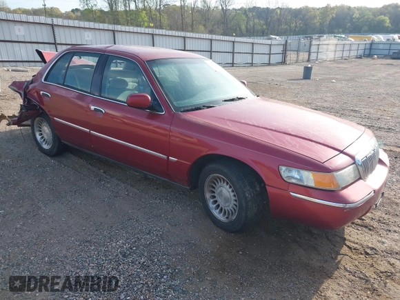 2000 Mercury Grand Marquis LS z VIN 2MEFM75W1YX736283, wystawiony jako IAAI lot #41879063 z przebiegiem 114 535 mil mil oraz . Historia ofert i sprzedaży dostępna na DreamBid. Obrazek 1.