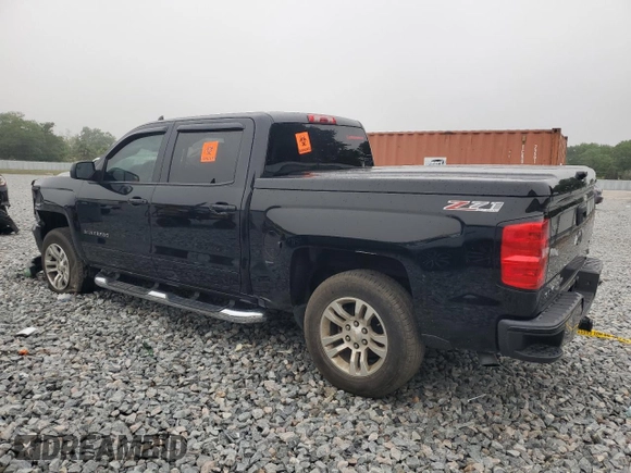 2016 Chevrolet Silverado 1500 LT with VIN 3GCUKREC1GG388719, listed as a Copart auction lot 49661455 with 138,886 mi miles and Salvage Title. Bid and sale history available at DreamBid. Image 2.