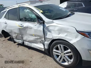 2018 Chevrolet Equinox Premier with VIN 2GNAXWEX3J6141427, listed as a IAAI auction lot 41830179 with 76,707 mi miles and . Bid and sale history available at carsss.com. Image 6.
