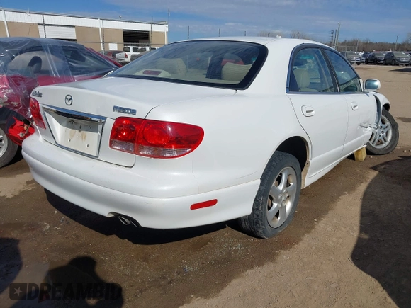 2002 Mazda Millenia S with VIN JM1TA222821725749, listed as a IAAI auction lot 41662948 with 165,088 mi miles and . Bid and sale history available at DreamBid. Image 4.