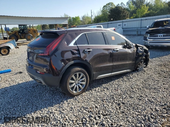 2021 Cadillac XT4 FWD Premium Luxury z VIN 1GYFZCR45MF002654, wystawiony jako Copart lot #52288105 z przebiegiem Nie podano mil oraz Szkody całkowita. Historia ofert i sprzedaży dostępna na DreamBid. Obrazek 3.