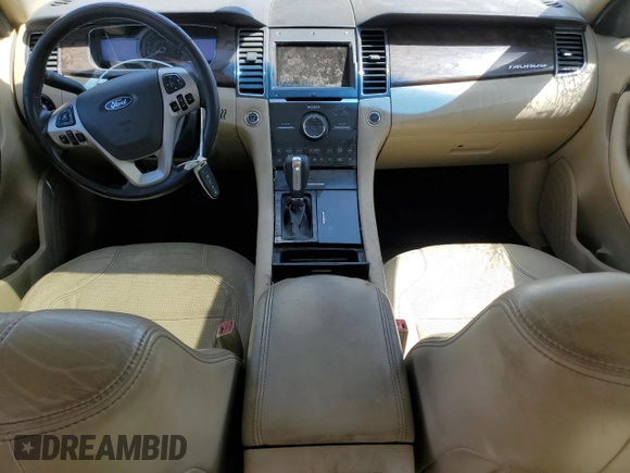 2013 Ford Taurus Limited with VIN 1FAHP2F8XDG154158, listed as a Copart auction lot 52065505 with 148,451 mi miles and Salvage Title. Bid and sale history available at DreamBid. Image 8.