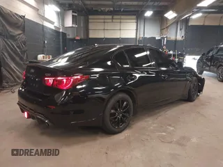2014 Infiniti Q50 Sport with VIN JN1BV7AR0EM704993, listed as a IAAI auction lot 42492764 with 64,811 mi miles and . Bid and sale history available at DreamBid. Image 4.