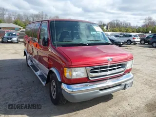 1999 Ford Econoline Passenger XL with VIN 1FMRE11L1XHA05657, listed as a IAAI auction lot 41968923 with 150,868 mi miles. Bid and sale history available at carsss.com. Image 1.