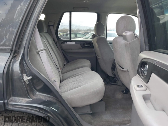 2005 GMC Envoy SLT with VIN 1GKDT13S352258833, listed as a IAAI auction lot 41525149 with 213,829 mi miles. Bid and sale history available at carsss.com. Image 8.