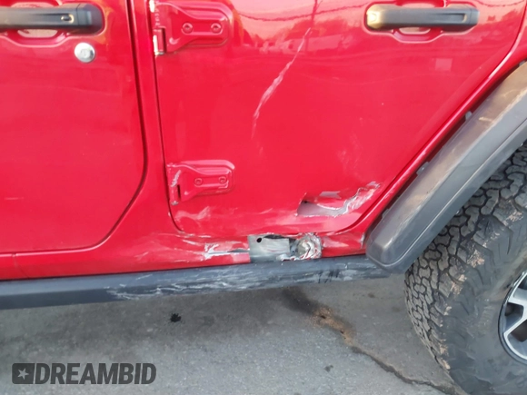 2022 Jeep Wrangler Unlimited Rubicon with VIN 1C4HJXFN4NW261809, listed as a IAAI auction lot 41459519 with 30,422 mi miles and . Bid and sale history available at DreamBid. Image 6.