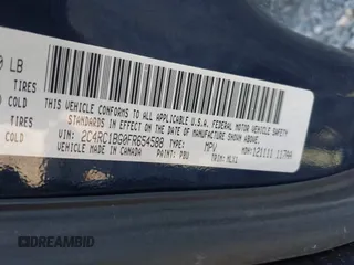 2015 Chrysler Town & Country Touring with VIN 2C4RC1BG0FR654588, listed as a IAAI auction lot 42001538 with 175,403 mi miles. Bid and sale history available at carsss.com. Image 9.