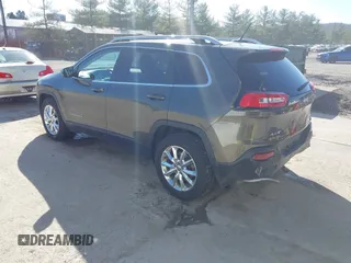 2015 Jeep Cherokee Limited with VIN 1C4PJMDS0FW685749, listed as a IAAI auction lot 41834880 with 161,614 mi miles. Bid and sale history available at carsss.com. Image 3.