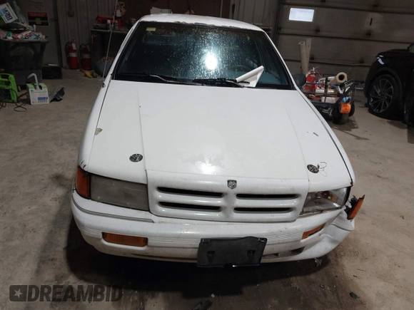 1994 Dodge Spirit z VIN 3B3AA46KXRT214299, wystawiony jako IAAI lot #41908262 z przebiegiem 72 619 mil mil oraz . Historia ofert i sprzedaży dostępna na DreamBid. Obrazek 12.