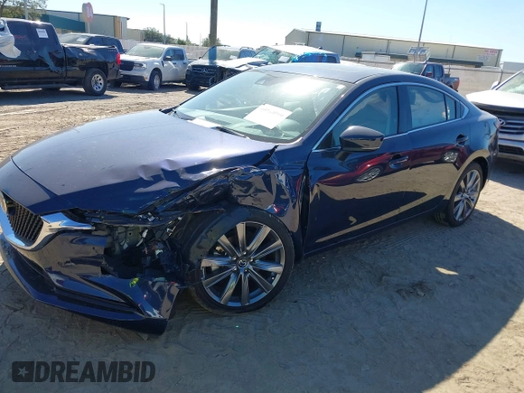 2021 Mazda 6 Grand Touring with VIN JM1GL1TY3M1619771, listed as a IAAI auction lot 40964809 with 25,816 mi miles and . Bid and sale history available at DreamBid. Image 2.
