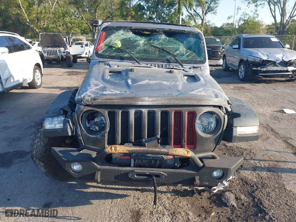 2020 Jeep Wrangler Unlimited Rubicon with VIN 1C4HJXFN1LW114022, listed as a IAAI auction lot 41760099 with 87,622 mi miles. Bid and sale history available at carsss.com. Image 11.