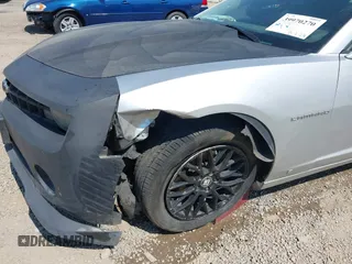 2010 Chevrolet Camaro 1LT z VIN 2G1FB1EV0A9147806, wystawiony jako IAAI lot #39970270 z przebiegiem 160 458 mil mil oraz . Historia ofert i sprzedaży dostępna na DreamBid. Obrazek 6.