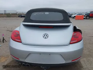 2013 Volkswagen Beetle Convertible 2.5L with VIN 3VW5X7AT0DM821473, listed as a IAAI auction lot 41103124 with 112,953 mi miles. Bid and sale history available at carsss.com. Image 16.