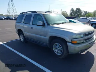 2005 Chevrolet Tahoe Z71 z VIN 1GNEK13T95R137279, wystawiony jako IAAI lot #41941680 z przebiegiem 186 060 mil mil oraz . Historia ofert i sprzedaży dostępna na DreamBid. Obrazek 1.