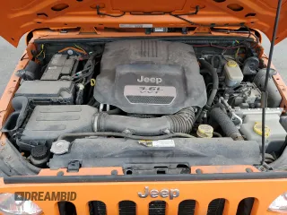 2013 Jeep Wrangler Unlimited Sport z VIN 1C4BJWDG7DL522421, wystawiony jako Copart lot #73010024 z przebiegiem 55 915 mil mil oraz Tytuł czysty. Historia ofert i sprzedaży dostępna na DreamBid. Obrazek 11.