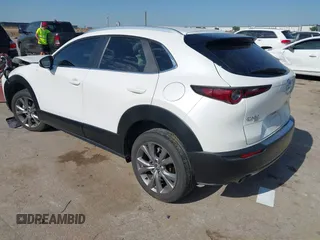 2023 Mazda CX-30 S Carbon Edition with VIN 3MVDMBCM2PM552282, listed as a IAAI auction lot 42241909 with 14,765 mi miles and . Bid and sale history available at DreamBid. Image 3.