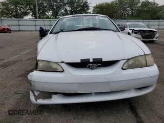 1997 Ford Mustang with VIN 1FALP4046VF180467, listed as a Copart auction lot 60754265 with 154,676 mi miles and Salvage title. Bid and sale history available at DreamBid. Image 5.