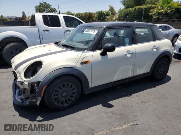 2017 MINI Hardtop 4 Door Cooper with VIN WMWXU1C32H2F77790, listed as a Copart auction lot 62352415 with 71,661 mi miles and Salvage title. Bid and sale history available at DreamBid. Image 1.