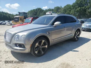 2017 Bentley Bentayga W12 z VIN SJAAC2ZV1HC012546, wystawiony jako Copart lot #68628744 z przebiegiem 49 070 mil mil oraz Szkoda całkowita • Salvage title. Historia ofert i sprzedaży dostępna na DreamBid. Obrazek 1.