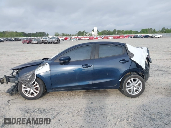 2016 Scion iA with VIN 3MYDLBZV1GY129384, listed as a IAAI auction lot 41978059 with 166,182 mi miles. Bid and sale history available at carsss.com. Image 14.