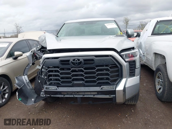 2022 Toyota Tundra Limited Hybrid with VIN 5TFJC5DB8NX009385, listed as a IAAI auction lot 41952224 with 40,497 mi miles and . Bid and sale history available at DreamBid. Image 12.