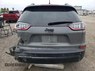 2023 Jeep Cherokee Altitude Lux with VIN 1C4PJMMB0PD115196, listed as a Copart auction lot 41528365 with 27,059 mi miles and Salvage Title. Bid and sale history available at carsss.com. Image 6.
