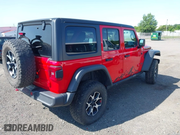 2021 Jeep Wrangler Unlimited Rubicon with VIN 1C4HJXFG2MW575541, listed as a IAAI auction lot 42247475 with 92,353 mi miles and . Bid and sale history available at DreamBid. Image 4.