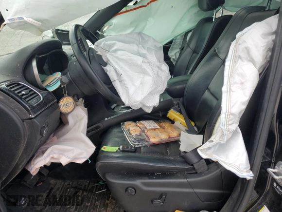 2021 Jeep Grand Cherokee Overland with VIN 1C4RJFCG6MC582917, listed as a Copart auction lot 50389315 with 55,000 mi miles and Salvage title. Bid and sale history available at DreamBid. Image 7.